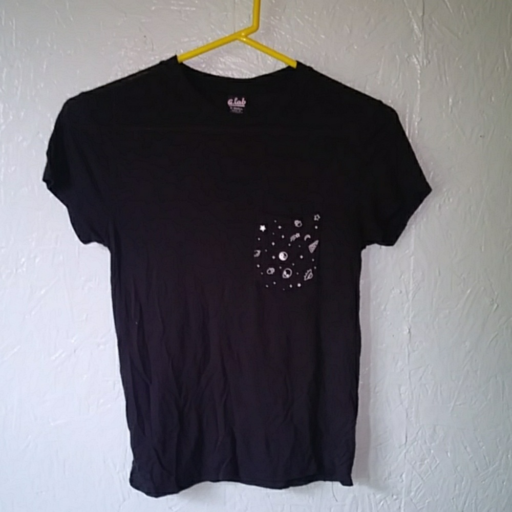 A black shirt with aliens